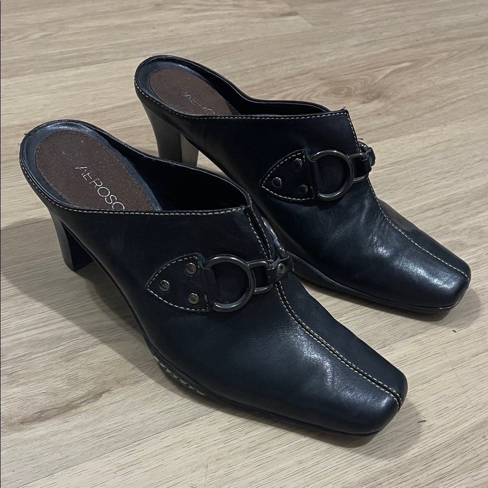 AEROSOLES Black Leather Mules with Buckle Detail